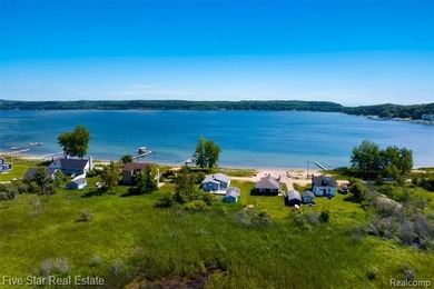 Nestled along the north shore of Portage Lake with 68 feet of - photo 5