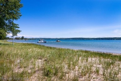 Nestled along the north shore of Portage Lake with 68 feet of - photo 6