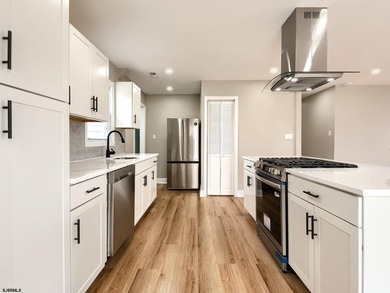 Welcome home on Hamilton. This fully remodeled and somewhat - photo 17