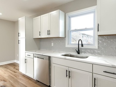 Welcome home on Hamilton. This fully remodeled and somewhat - photo 19