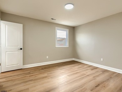 Welcome home on Hamilton. This fully remodeled and somewhat - photo 29