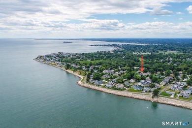 Discover exceptional coastal living in this beautifully rebuilt