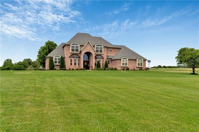 Beautiful custom-built home on 2.5 acres in the desirable - photo 1