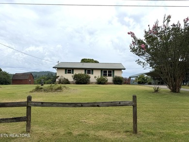 Wonderful lake views welcome you to this charming home situated - photo 1