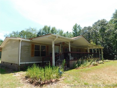 For Sale! This charming three-bedroom, two-bathroom home is