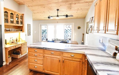 LAKEFRONT LIVING, WITH SWEEPING, PANORAMIC LAKE & MOUNTAIN - photo 15