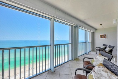 Enjoy breathtaking views from this BEACH FRONT corner unit condo - photo 1