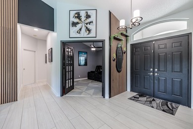 Step into this immaculate, model-like 3BR/2BA home with a den in - photo 7