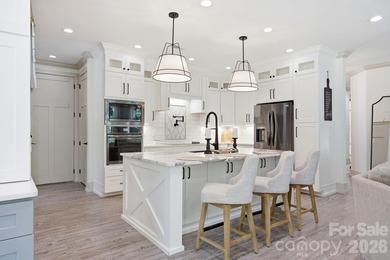 2023 build, sitting on 4.77 acres this 4BR, 3.5BA home blends - photo 12