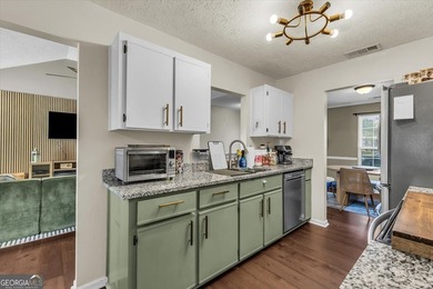 Welcome home to this charming 3-bedroom, 2-bath home in the - photo 12