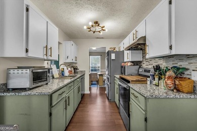 Welcome home to this charming 3-bedroom, 2-bath home in the - photo 14