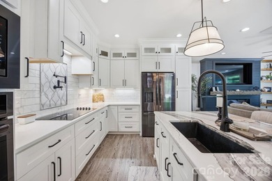 2023 build, sitting on 4.77 acres this 4BR, 3.5BA home blends - photo 15