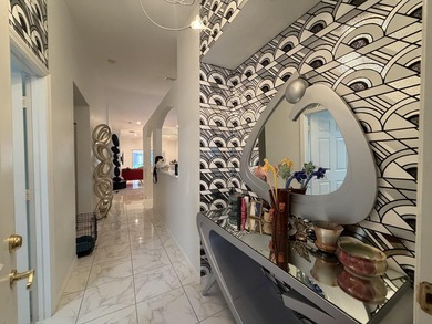 Located in the desirable Tuscany Bay community, this charming - photo 10