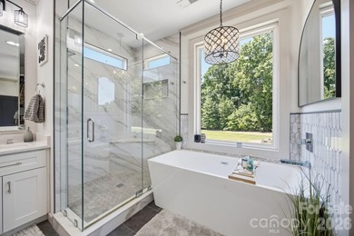2023 build, sitting on 4.77 acres this 4BR, 3.5BA home blends - photo 22