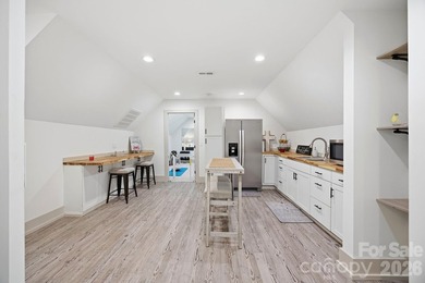 2023 build, sitting on 4.77 acres this 4BR, 3.5BA home blends - photo 30