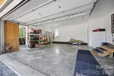 2023 build, sitting on 4.77 acres this 4BR, 3.5BA home blends - photo 35