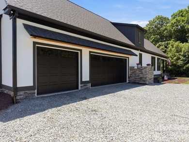 2023 build, sitting on 4.77 acres this 4BR, 3.5BA home blends - photo 38