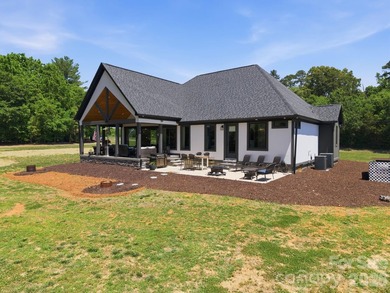 2023 build, sitting on 4.77 acres this 4BR, 3.5BA home blends - photo 43