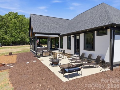 2023 build, sitting on 4.77 acres this 4BR, 3.5BA home blends - photo 44