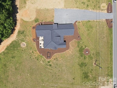2023 build, sitting on 4.77 acres this 4BR, 3.5BA home blends - photo 46
