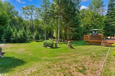 Secluded and wooded lot in Lakewood shores. Original owners have - photo 7