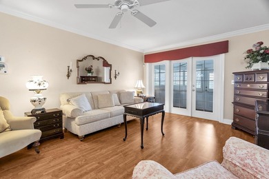 Welcome to this beautifully updated villa, featuring a spacious - photo 7