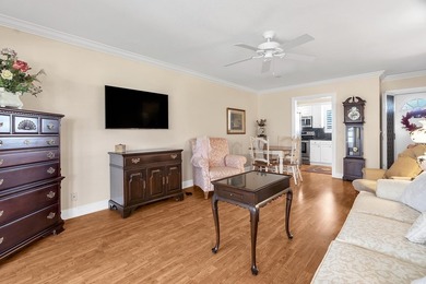 Welcome to this beautifully updated villa, featuring a spacious - photo 8