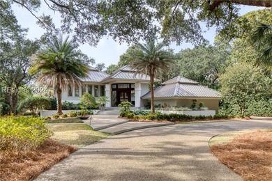 This one-of-a-kind property is privately sited on almost an acre - photo 1