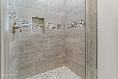 Positioned within the private gates of Shearwater on Hilton Head