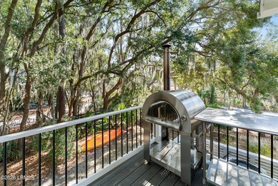 Positioned within the private gates of Shearwater on Hilton Head