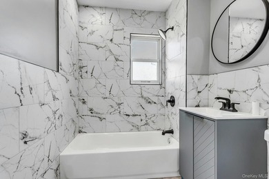 Welcome to 171-38 105 Avenue, a beautifully renovated two-family - photo 17