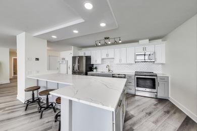 Experience breathtaking, unobstructed lake views from every room