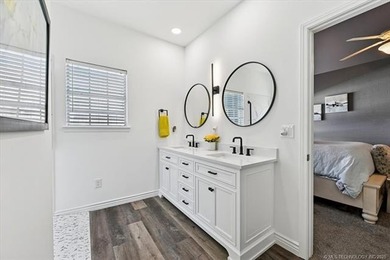 Welcome to this charming patio home nestled within the gated