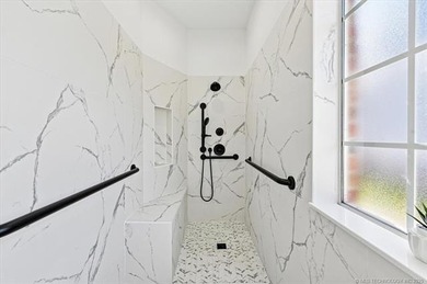 Welcome to this charming patio home nestled within the gated