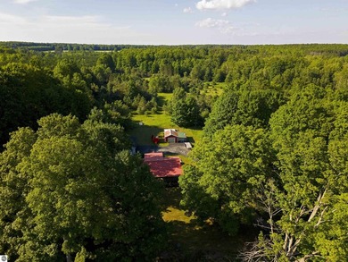 Escape to the peace and privacy of Northern Michigan with this - photo 3