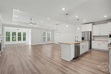Enjoy modern low-maintenance living in the gated Herb River - photo 6