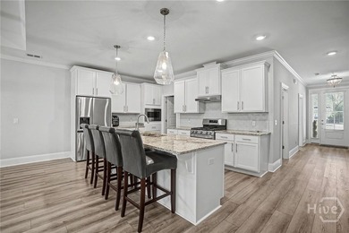 Enjoy modern low-maintenance living in the gated Herb River - photo 7