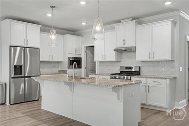 Enjoy modern low-maintenance living in the gated Herb River - photo 8