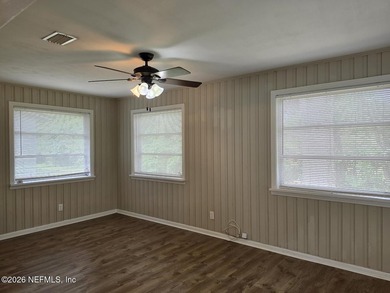 Introducing this Quaint 3 bedroom/2 bath house located in the - photo 4