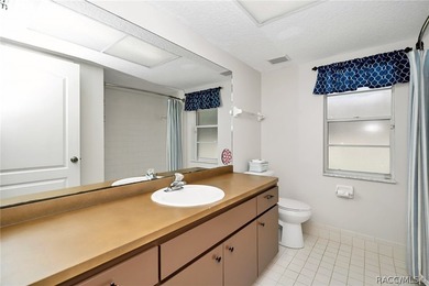 Welcome to this light and bright three-bedroom pool home tucked - photo 24