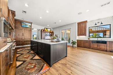 This fully remodeled 6,514 square foot estate offers an - photo 13