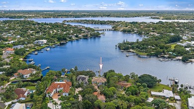 Nestled on nearly one acre of pristine riverfront, this - photo 17