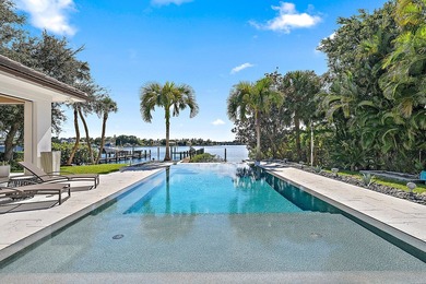 Nestled on nearly one acre of pristine riverfront, this - photo 18