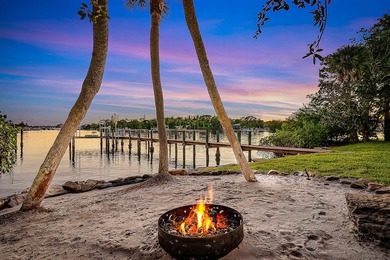 Nestled on nearly one acre of pristine riverfront, this - photo 19