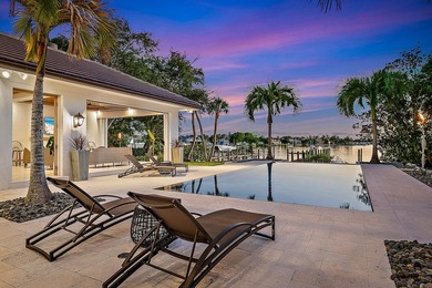 Nestled on nearly one acre of pristine riverfront, this - photo 20