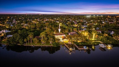 Nestled on nearly one acre of pristine riverfront, this - photo 32