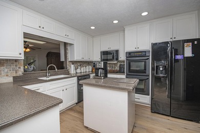 Welcome home to this beautifully updated ranch-style residence - photo 23
