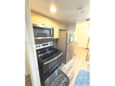 Discover this beautiful 2-bedroom, 2-bath condo with nearly 1