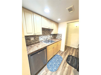 Discover this beautiful 2-bedroom, 2-bath condo with nearly 1