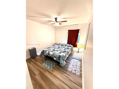 Discover this beautiful 2-bedroom, 2-bath condo with nearly 1